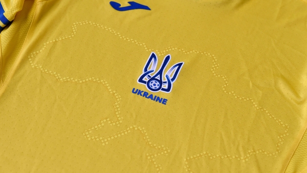 The uniforms feature the silhouette of Ukraine that includes Russia-annexed Crimea and the separatist-controlled regions of Donetsk and Lugansk as well as slogans