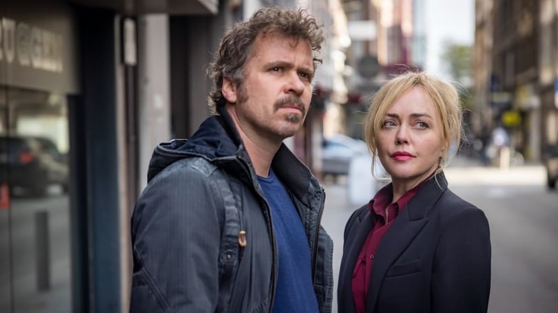 Angeline Ball and Wouter Hendrickx in Hidden Assets Photo Credit: Guillaume Van Laethem/Saffron Pictures/RTÉ/AcornTV
