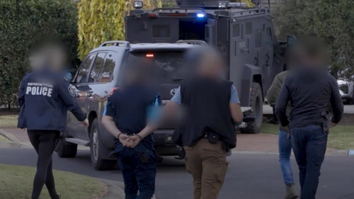 Victoria Police make arrests in Sydenham, Victoria, Australia, as part of Operation Ironside