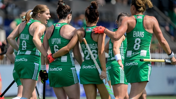 Goalscorer Upton is congratulated by her team-mates