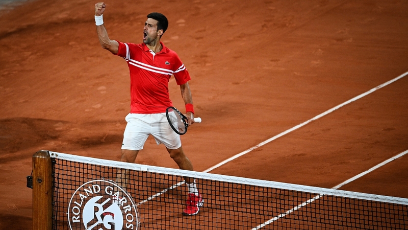 An animated Novak Djokovic celebrates his win on Court Philippe Chatrier