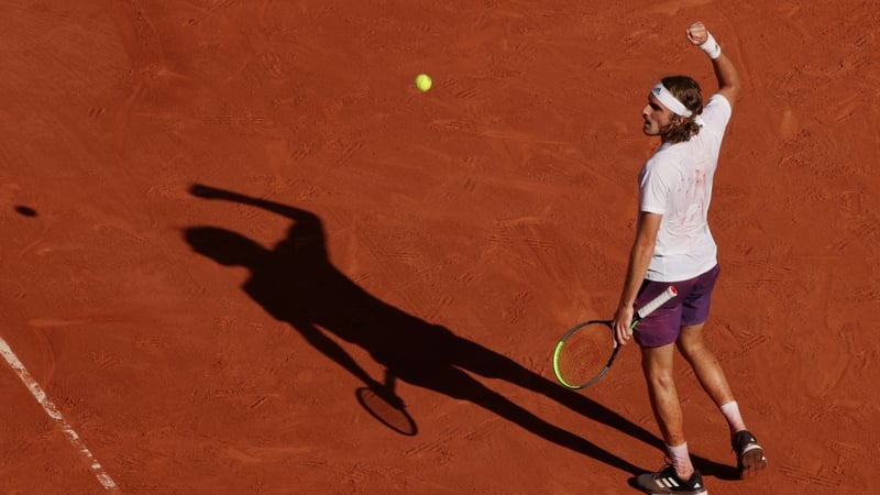 Stefanos Tsitsipas celebrates converting match point