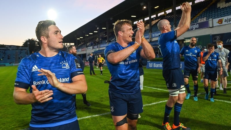 Jordan Larmour, Josh van der Flier and Devin Toner acknowledge the fans at the RDS