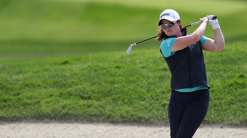 Maguire hits a shot on the ninth hole during round three