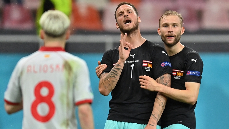 Austria's Marko Arnautovic (centre) celebrates scoring against North Macedonia