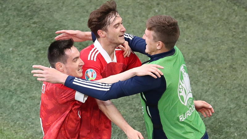 Russia's Aleksey Miranchuk (C) celebrates scoring with his team-mates