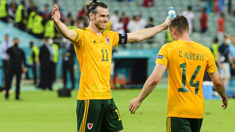 Gareth Bale (L) celebrates with Connor Roberts