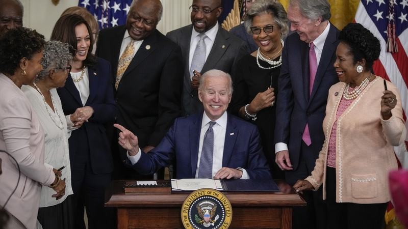 US President Joe Biden signs the Juneteenth National Independence Day Act into law at the White House