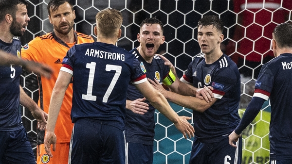 Andrew Robertson (centre) celebrates a late clearance as Scotland claimed a deserved draw at Wembley
