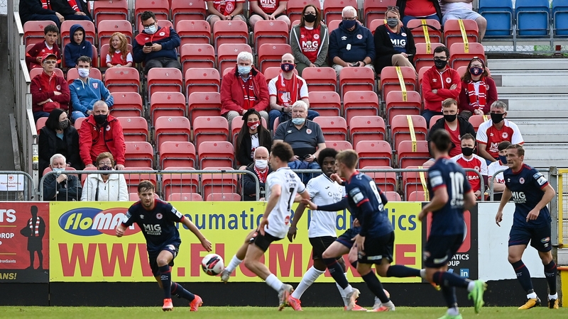 St Patrick's Athletic supporters watch on at Richmond Park