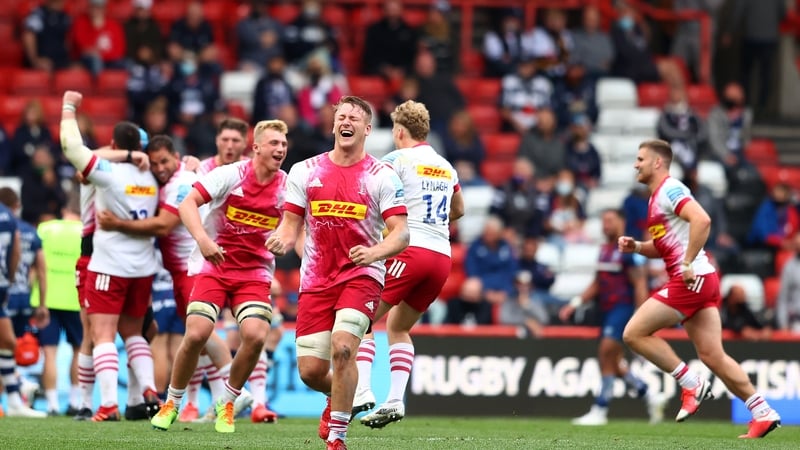 Harlequins players celebrate at the end of the match