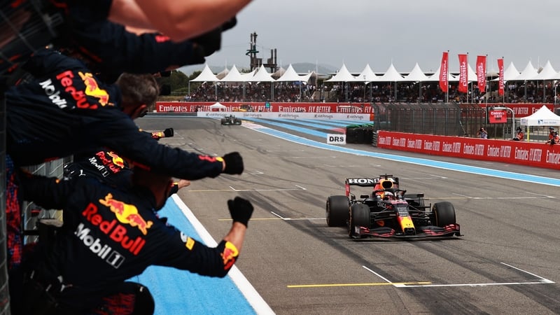 Max Verstappen is cheered on by his team