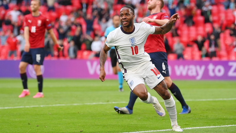 Raheem Sterling celebrates after scoring England's winner