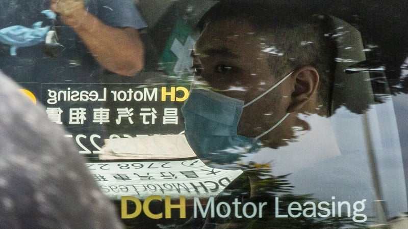 Tong Ying-kit is accused of driving his motorcycle into a group of police officers