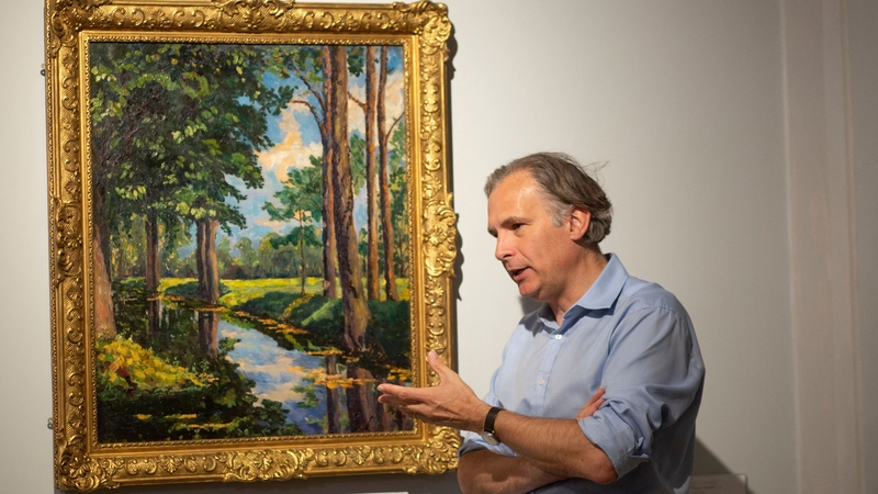 Jean Paul Engelen of Phillips Auction House pictured in front of 'The Moat, Breccles'