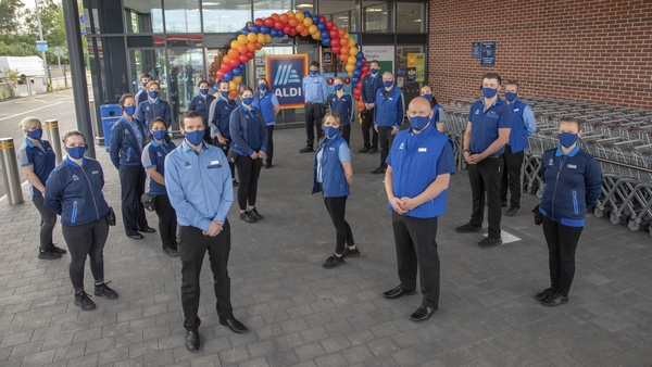 Aldi's Douglas store staff ahead of welcoming their first customer at the new store in Co Cork today