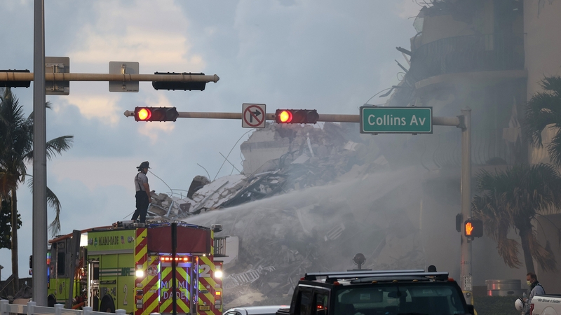 Hundreds of fire and rescue workers scoured through tonnes of rubble after the 12-storey residential building partially collapsed