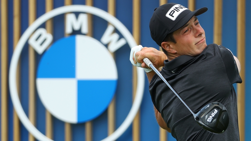 Viktor Hovland tees off on the fourth hole