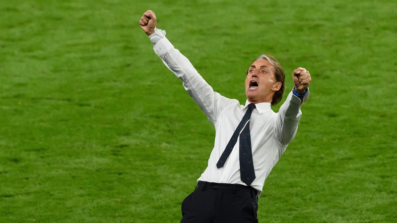 Roberto Mancini celebrates after his team edged out Austria