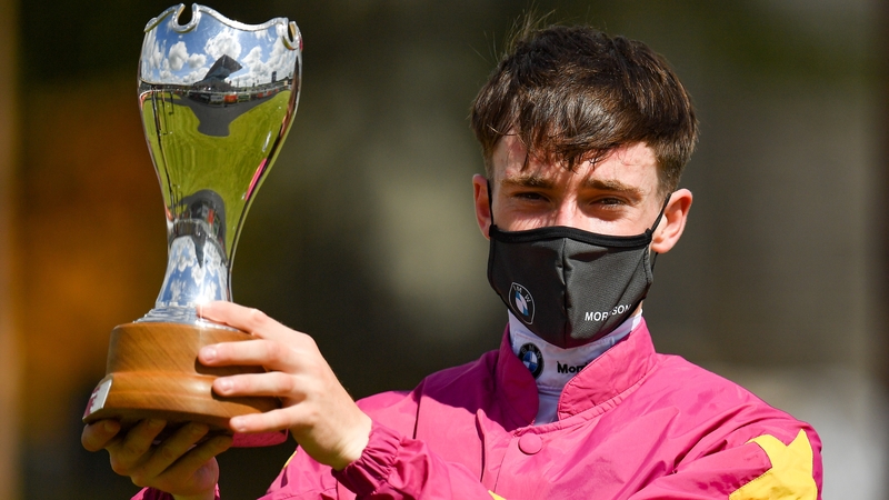 Jockey Shane Crosse with the trophy after riding Thundering Nights to victory in the Alwasmiyah Pretty Polly Stakes