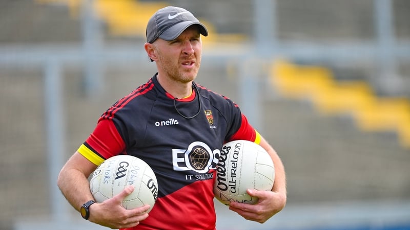 Paddy Tally will meet with Down officials to discuss his future as his three-year tenure as manager came to a disappointing end