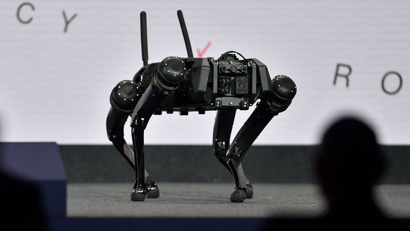 An autonomous robot is pictured at the Verizon stand during the Mobile World Congress fair in Barcelona