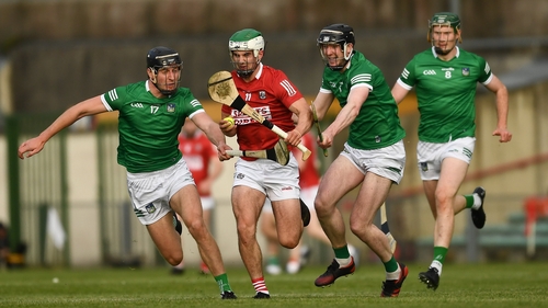 Shane Kingston (C) is tackled by Limerick's Conor Boylan (L) and Declan Hannon (R) in last month's league clash
