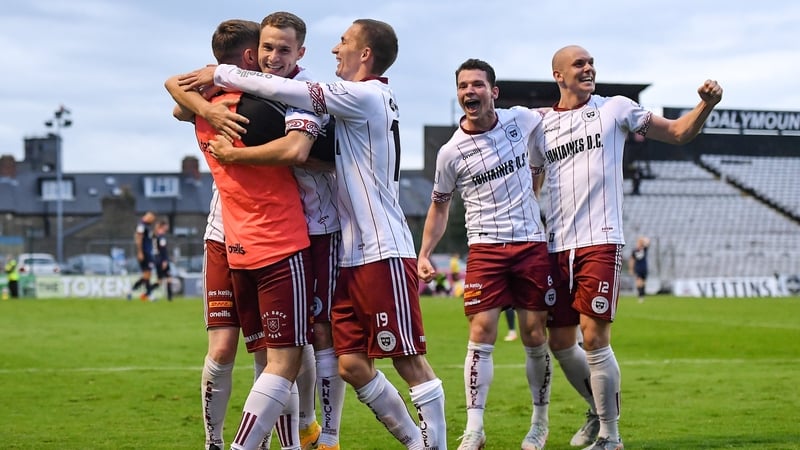 Liam Burt of Bohemians, second from left, celebrates with team-mates Anto Breslin, left, and Tyreke Wilson after scoring their side's third goa