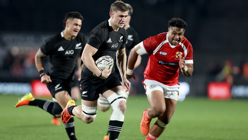 Dalton Papalii of the All Blacks makes a break against Tonga