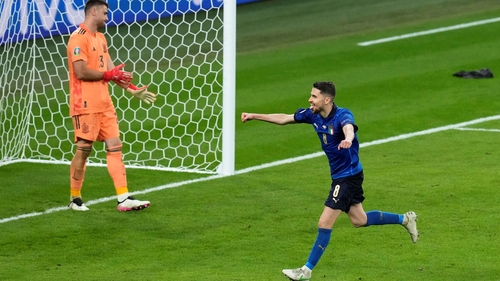 Jorginho wheels away to celebrate after scoring the winning penalty in the shootout