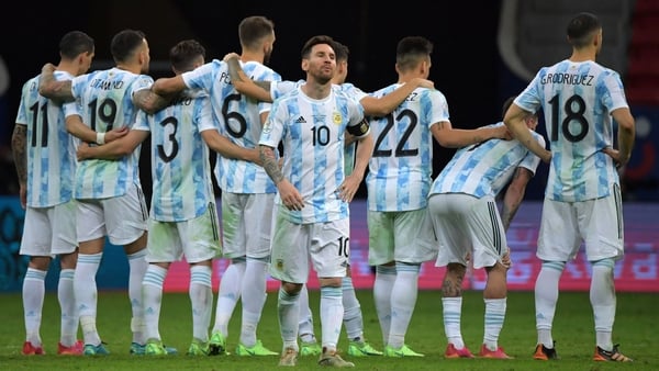 Lionel Messi and his Argentina team-mates during the penalty shootout