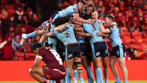 The New South Wales Blues celebrate winning Game 2 to secure this season's series