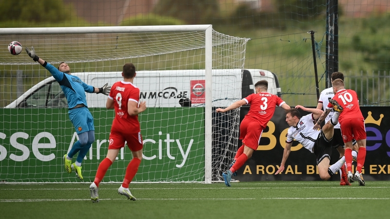 David McMillan heads home Dundalk's second goal