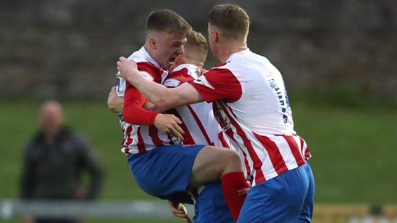 Willie Armshaw (L) celebrates his late leveller