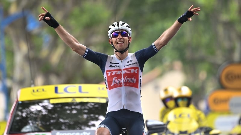 Bauke Mollema celebrates as he crosses the finish line to win stage 14