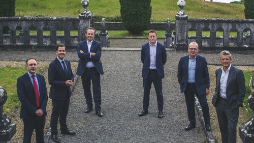Minister of State at the Department of Trade Enterprise & Employment Robert Troy, IDA Ireland CEO Martin Shanahan, Shane Keating, Des O'Connor and Conor Brennan from The Ardonagh Group and David Ross, CEO of The Ardonagh Group.
