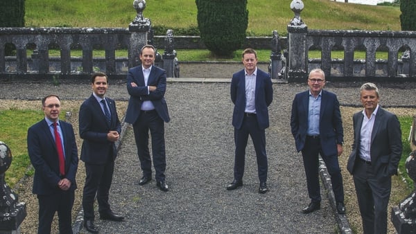 Minister of State at the Department of Trade Enterprise & Employment Robert Troy, IDA Ireland CEO Martin Shanahan, Shane Keating, Des O'Connor and Conor Brennan from The Ardonagh Group and David Ross, CEO of The Ardonagh Group.