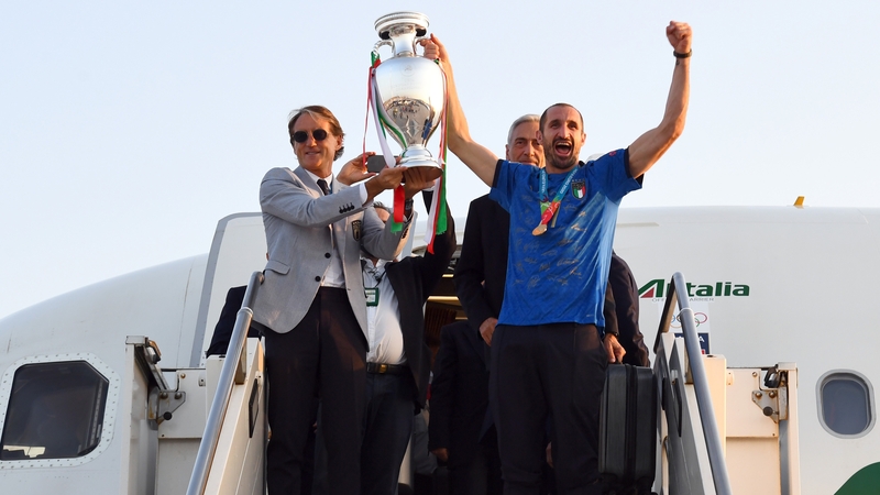 The Italy squad touched down on home soil early on Monday morning