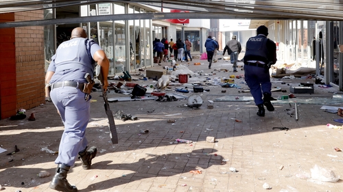 Six people have died and 219 people have been arrested, according to a police tally