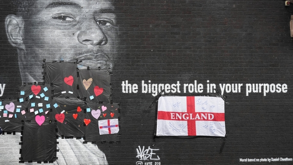 Locals left messages of support on the plastic that covers offensive graffiti on the mural of Marcus Rashford