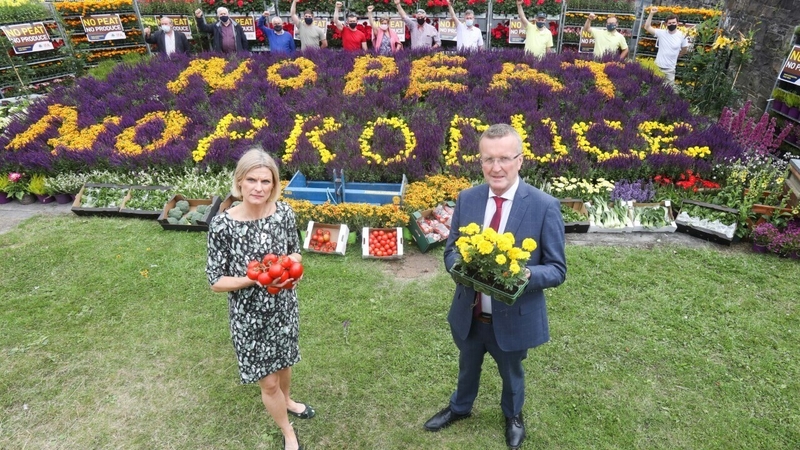 Minister of State for Land Use and Biodiversity Pippa Hackett and IFA President Tim Cullinan at today's 'No peat no produce' protest (Pic: Rollingnews.ie)