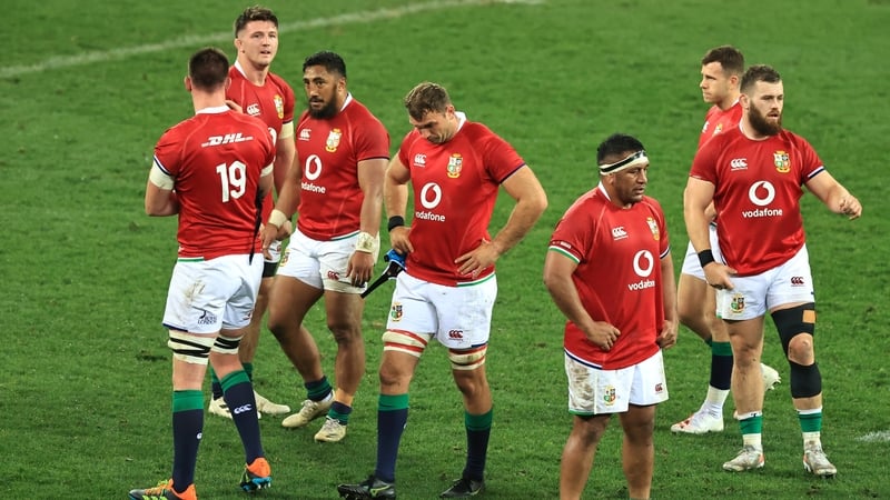 Lions players react at the full-time whistle