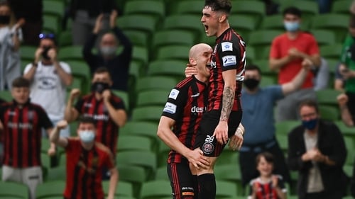 Georgie Kelly (L) celebrates with Dawson Devoy after scoring Bohemian's first goal