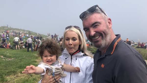 Máire Martha Ní Chathasaigh, David Lennon and their son Mac Dara enjoying the annual Féile Mhic Dara boat festival on Friday