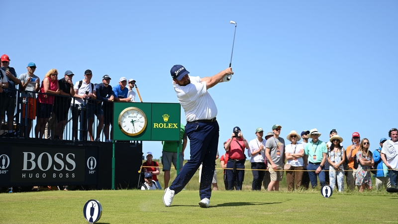 Shane Lowry hit two late birdies to keep him in with an outside chance of competing for the Claret Jug