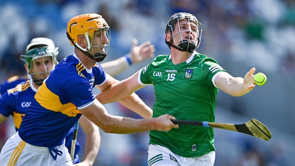 Peter Casey of Limerick is tackled by Barry Heffernan of Tipperary