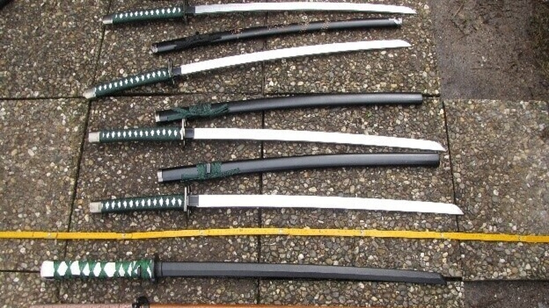 Police in Frankfurt said they seized a number of weapons, including guns, a crossbow, daggers and swords