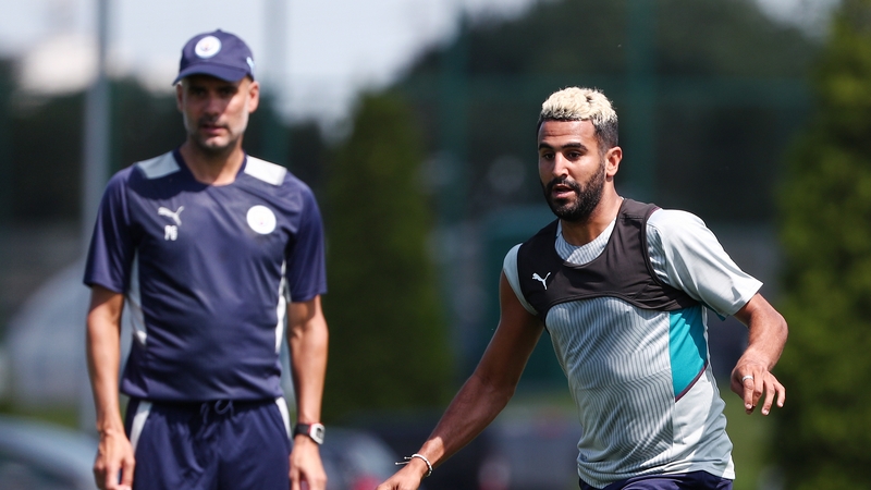 Riyad Mahrez under the watchful eye of Pep Guardiola during a pre-season training session on 20 July