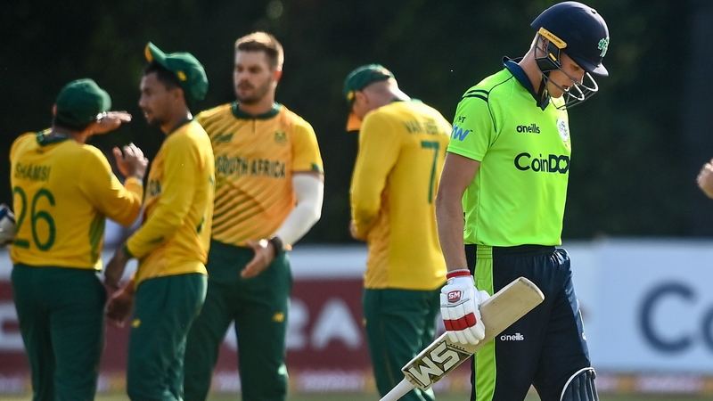 Ireland's Harry Tector trudges off the field after being caught out by Quinton de Kock