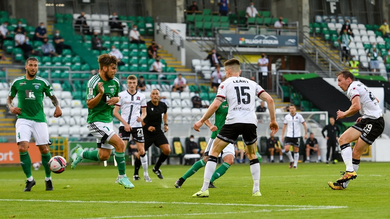David McMillan scores his side's second goal of the night